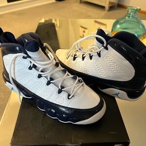 Kids grade school Jordan’s White and Blue Sneakers